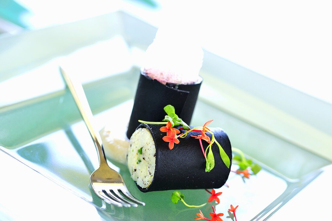 Squid ink cannelloni filled with king crab