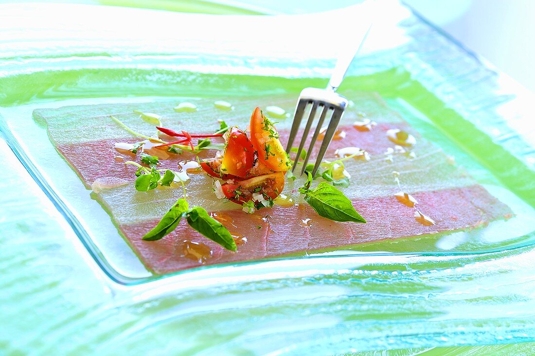 Tuna & swordfish carpaccio with cherry tomato salsa