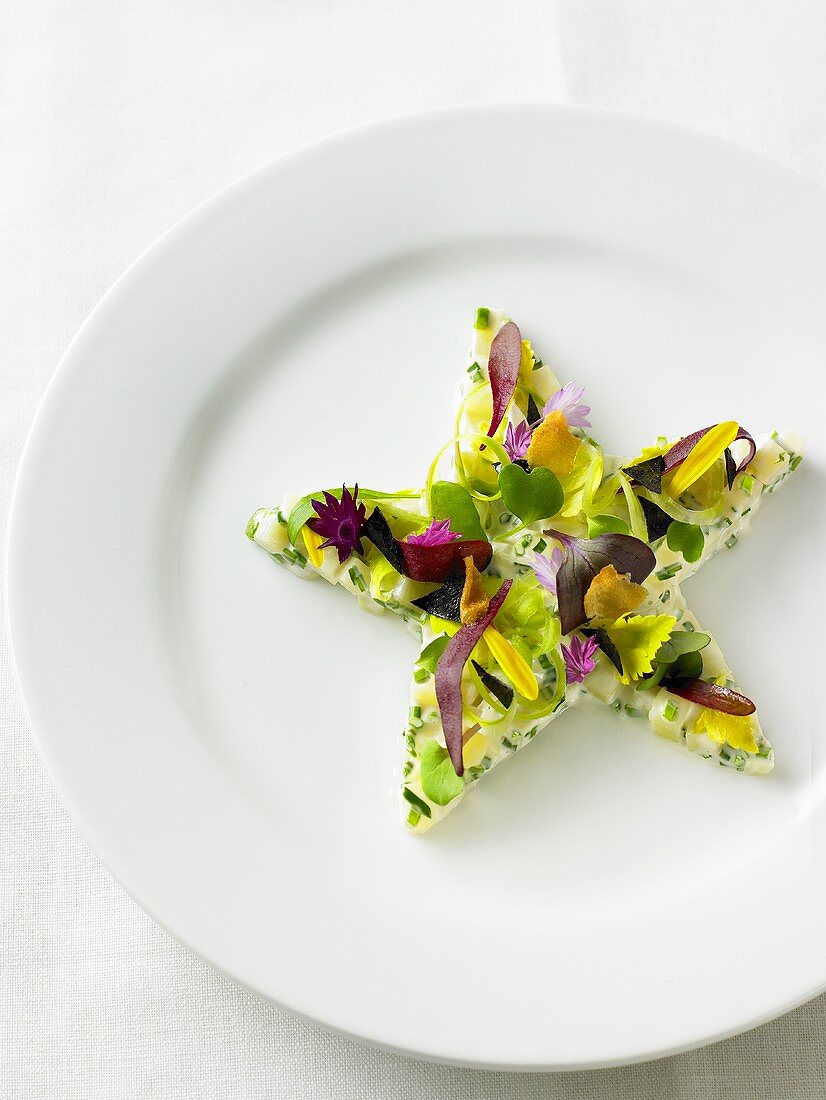 Potato salad star with edible flowers