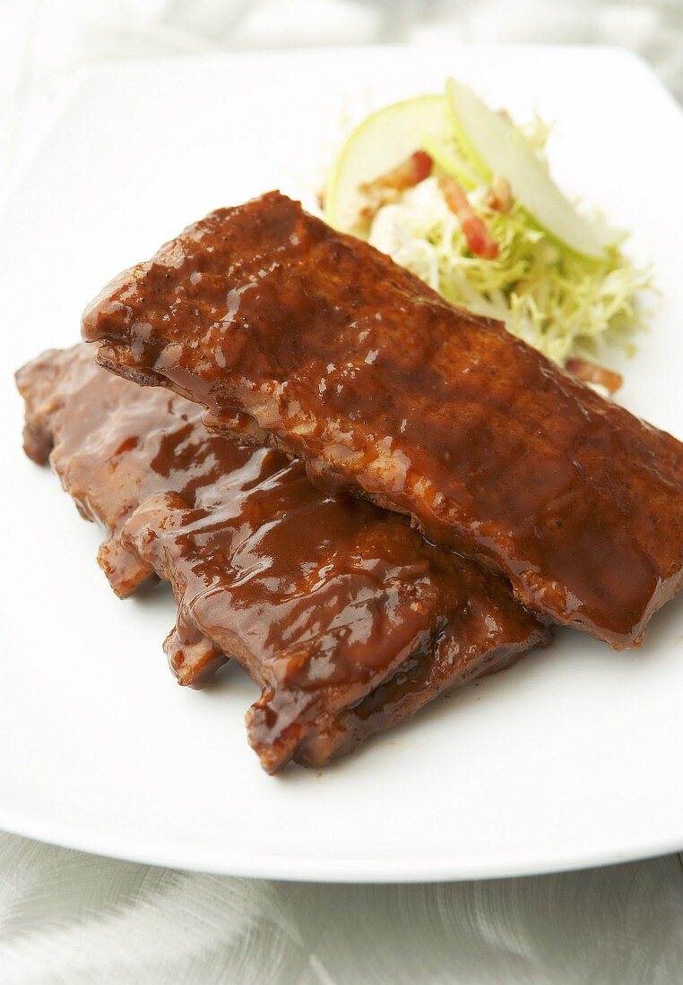Glazed spare ribs with barbecue sauce, coleslaw