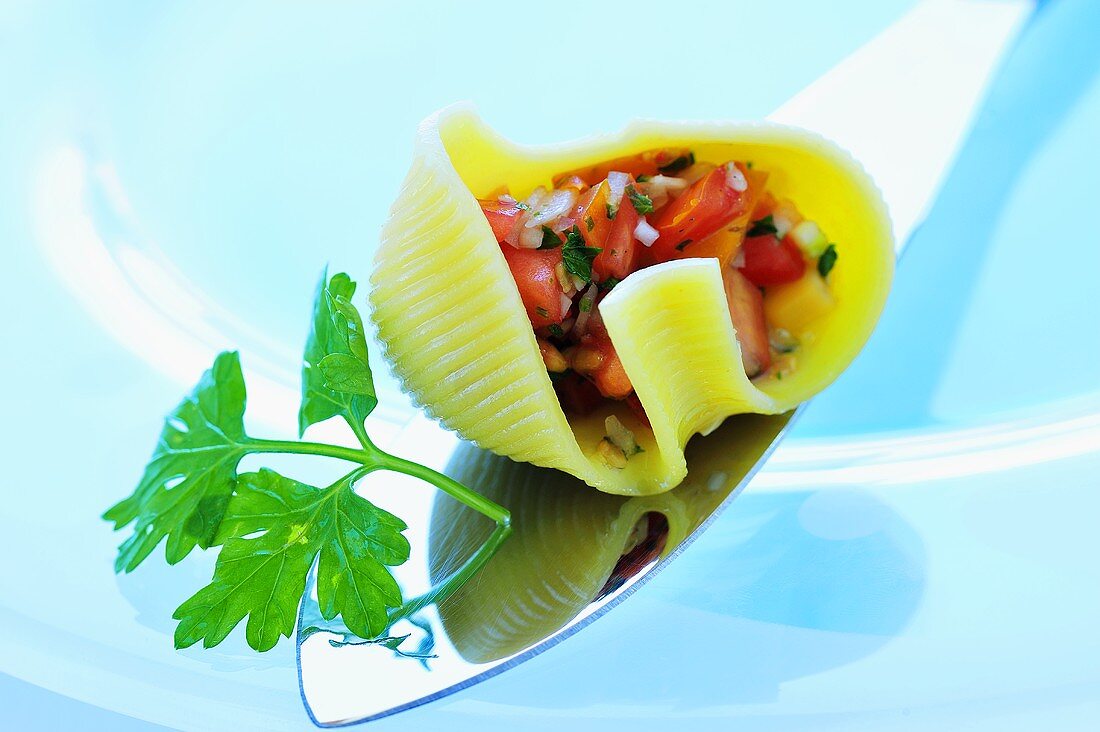 Lumaconi filled with tomato and sweetcorn salad