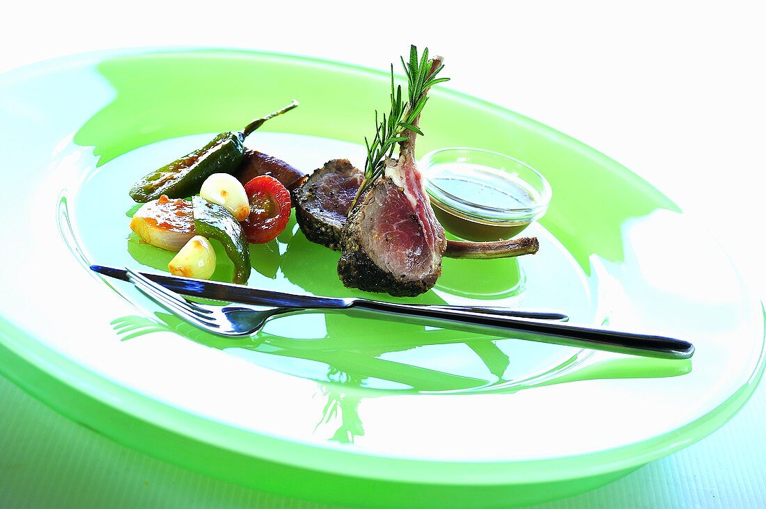 Grilled lamb chops with vegetables and mint sauce
