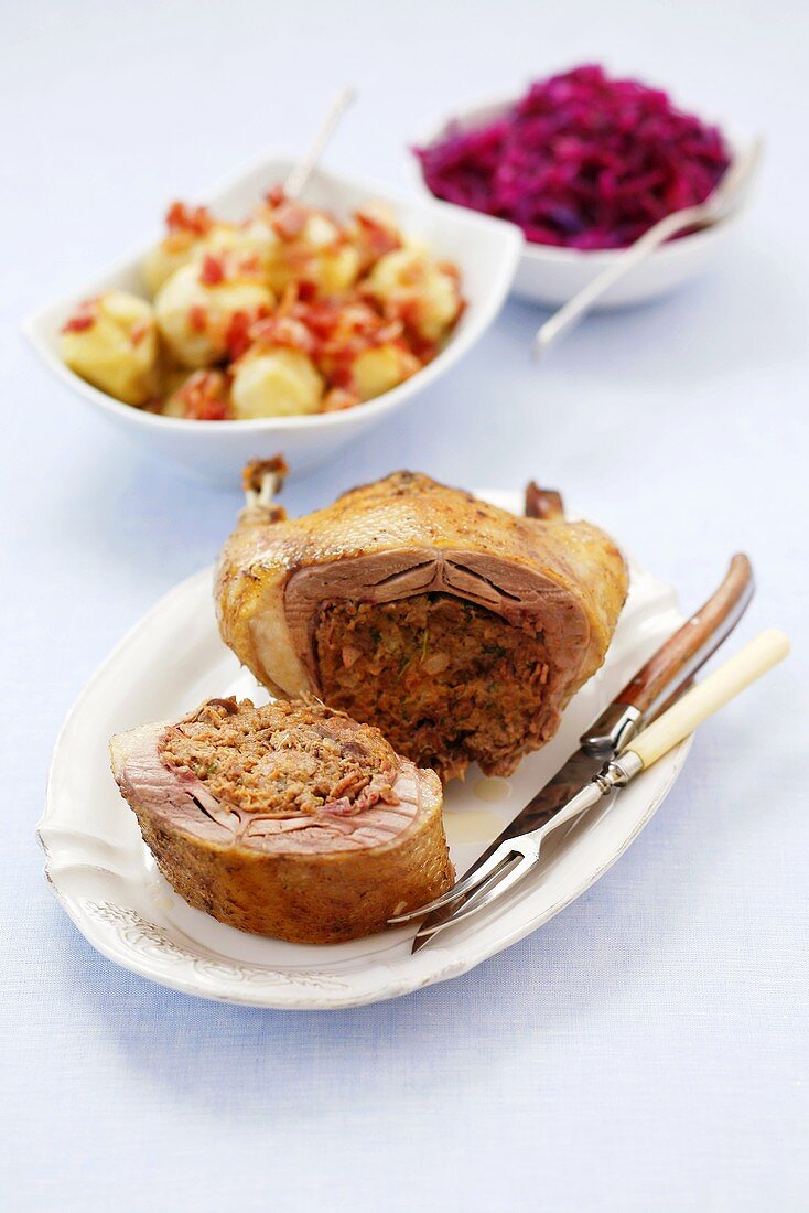 Stuffed duck with Silesian dumplings and red cabbage