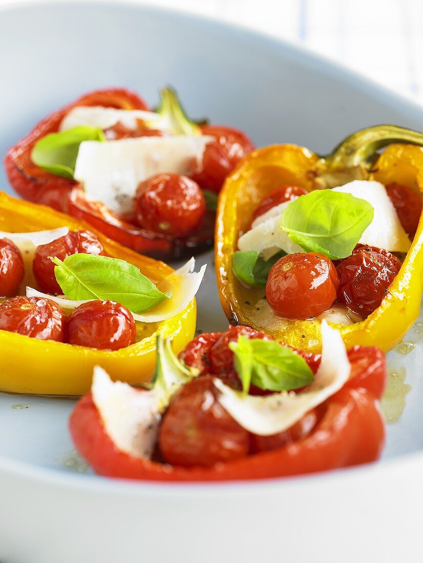 Peppers stuffed with tomatoes, mozzarella and basil