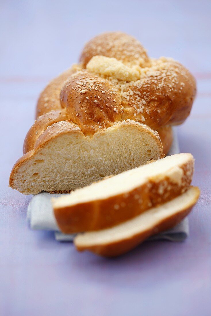 Bread plait, partly sliced