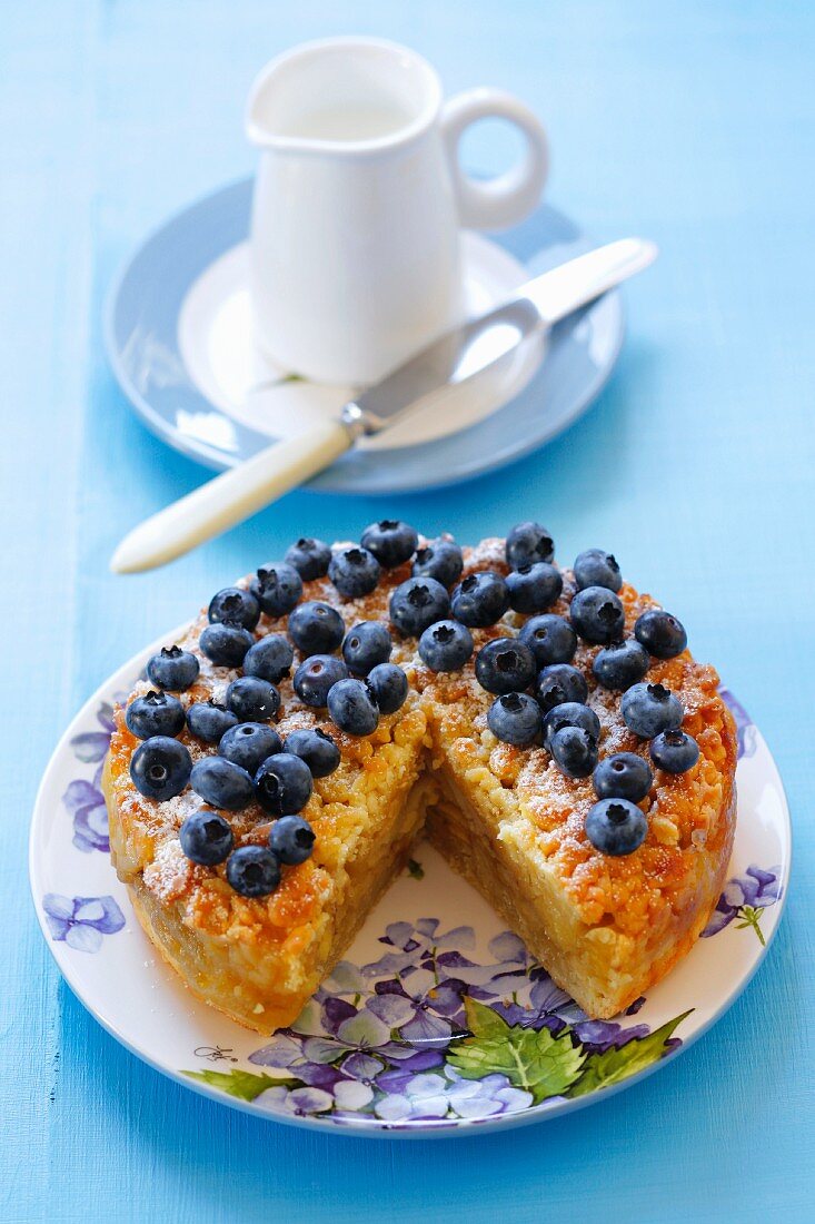 Apple crumble cake with fresh blueberries