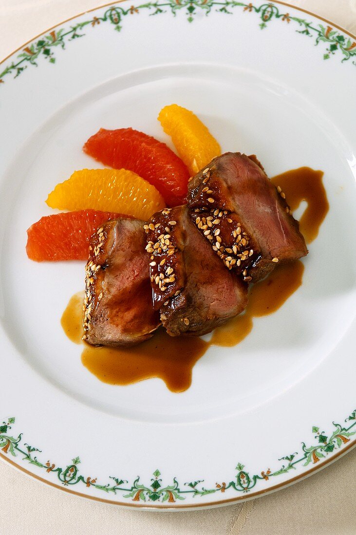 Beef fillet with citrus fruit and sesame seeds