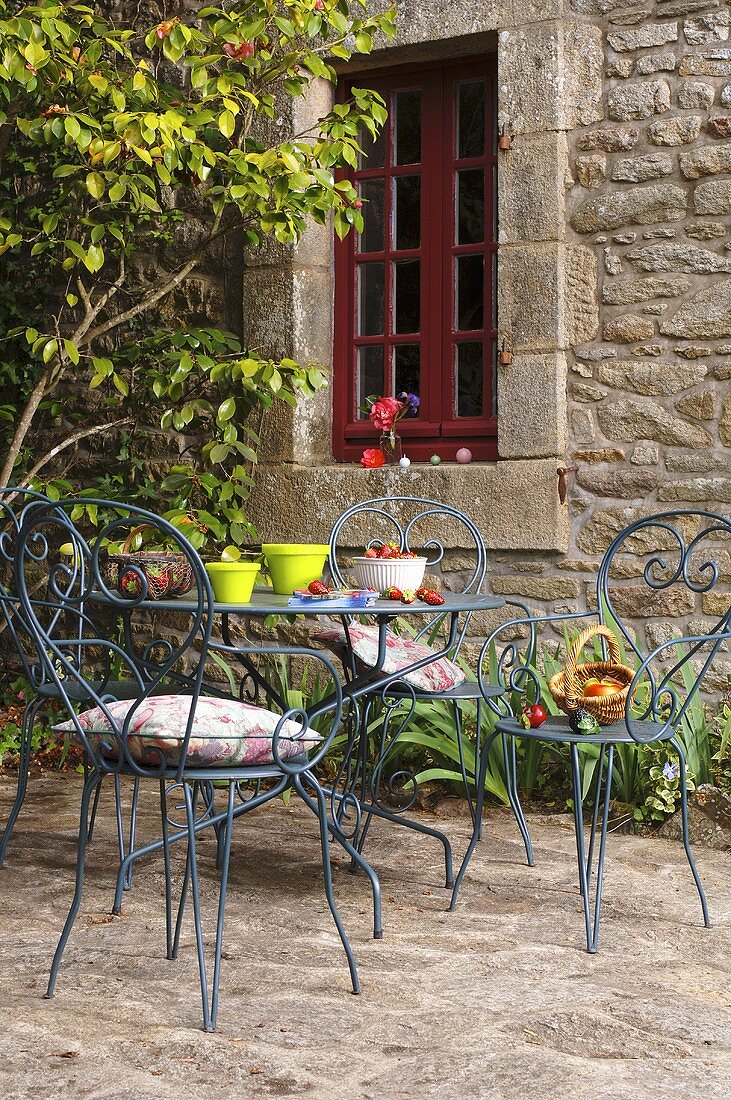 Garden table with artificial strawberries