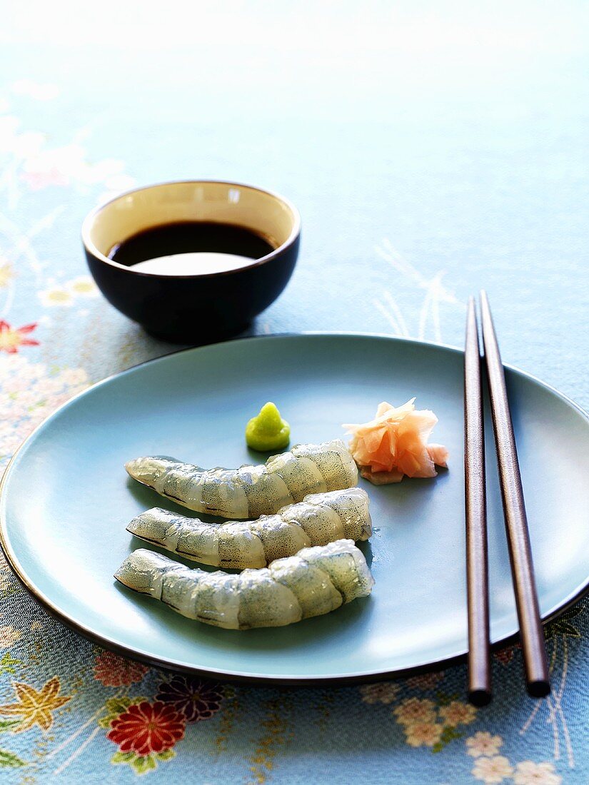 Prawn sashimi with ginger, wasabi and soy sauce