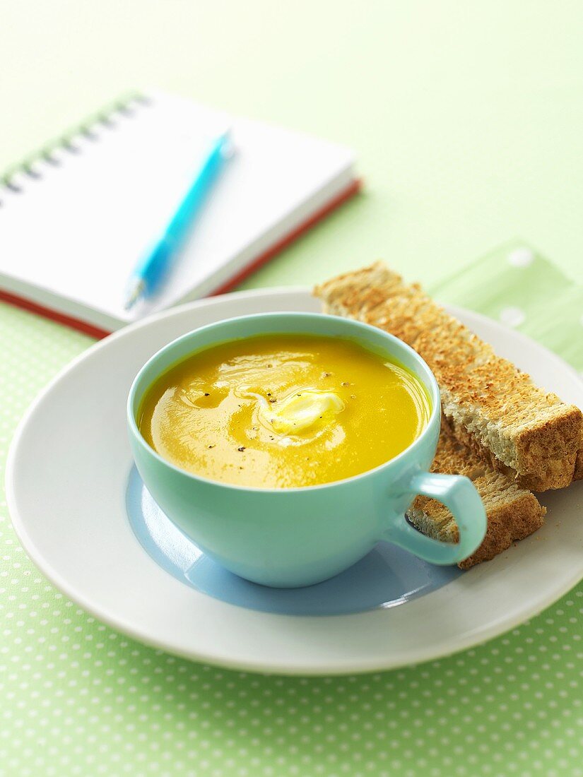 Pumpkin soup with toast