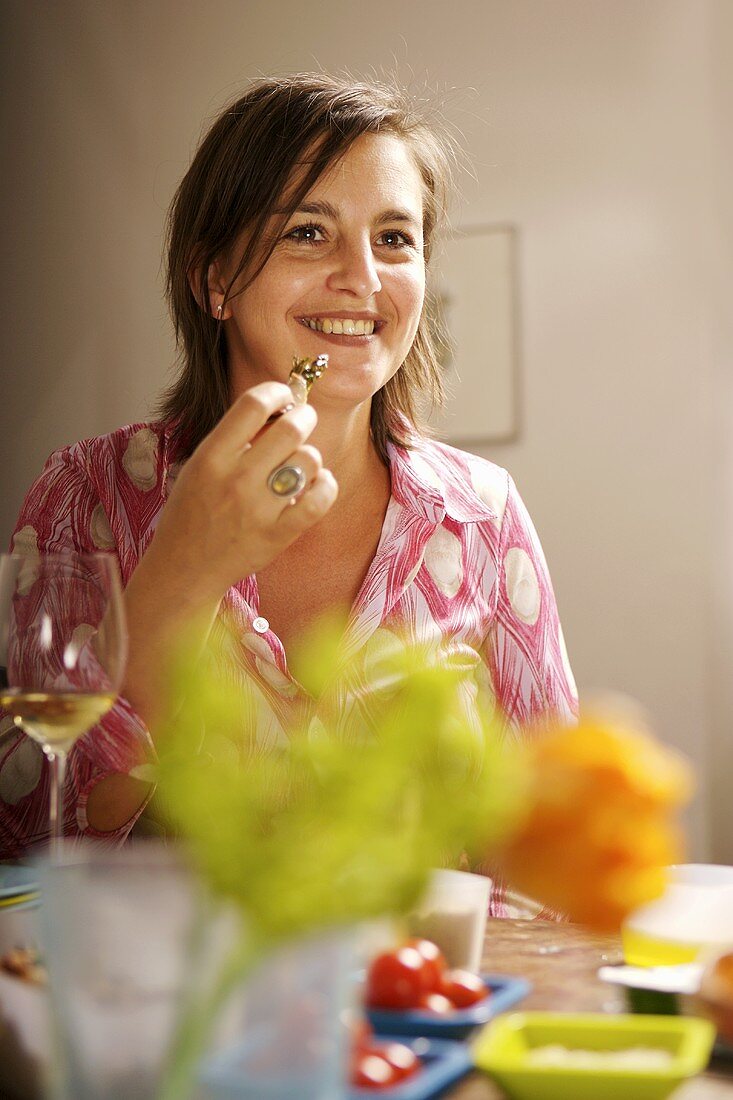 Woman eating finger food