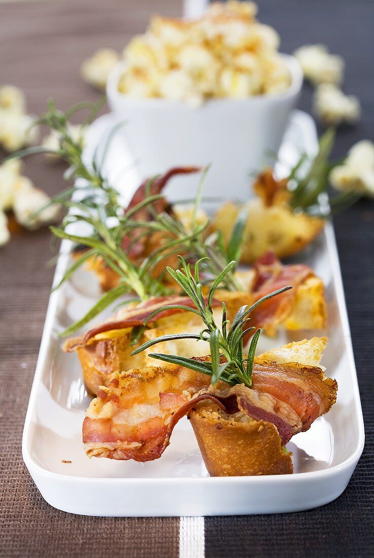 Bacon and white bread on rosemary skewers