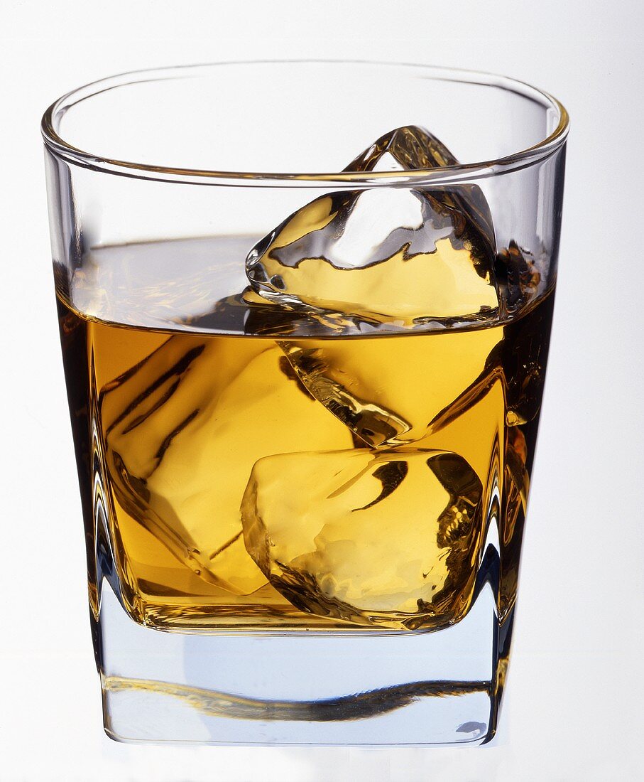 Whisky on the rocks in glass