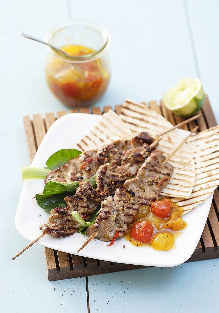 Veal kebabs (loin) with melon chutney and wraps