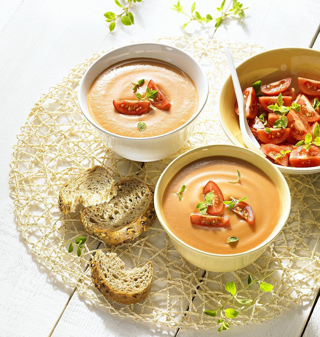 Cream of tomato soup, fresh tomatoes and bread