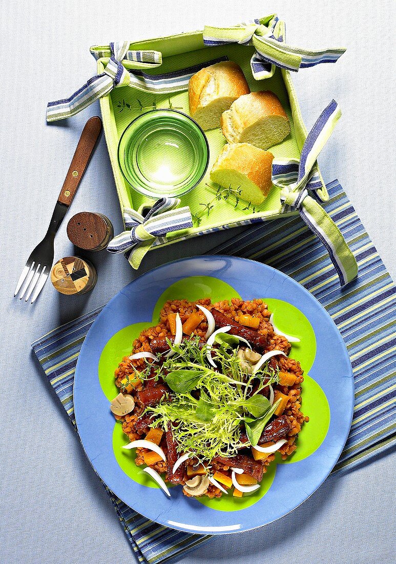 Red lentils with sausage, onions, mushrooms and carrots