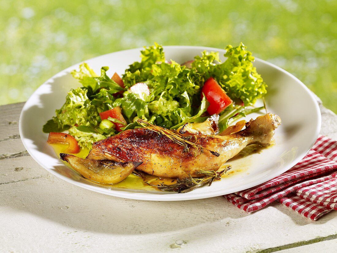 Lemon chicken with salad leaves