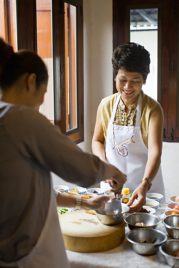 Thai women cooking