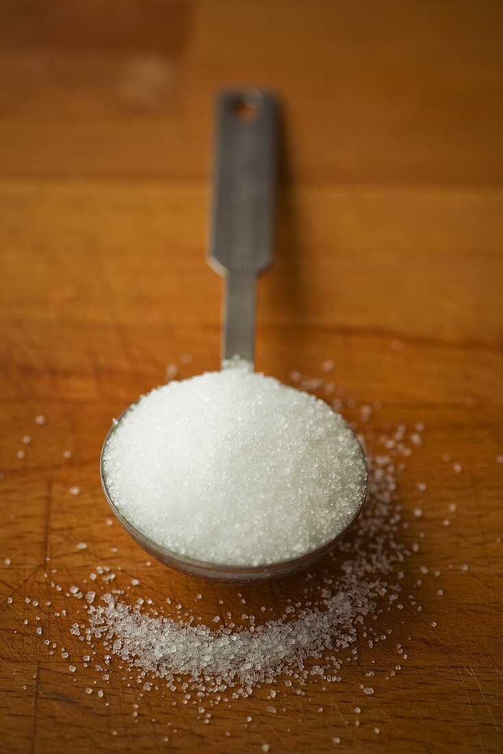 Sugar in measuring spoon