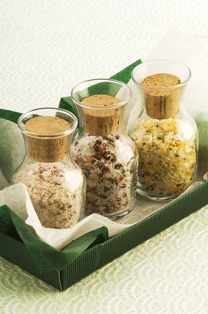Three jars of different spiced salts