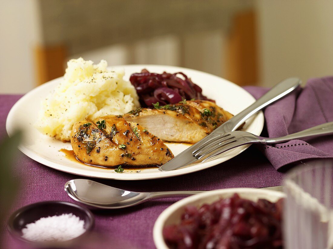 Chicken breast with red wine onions and mashed potato