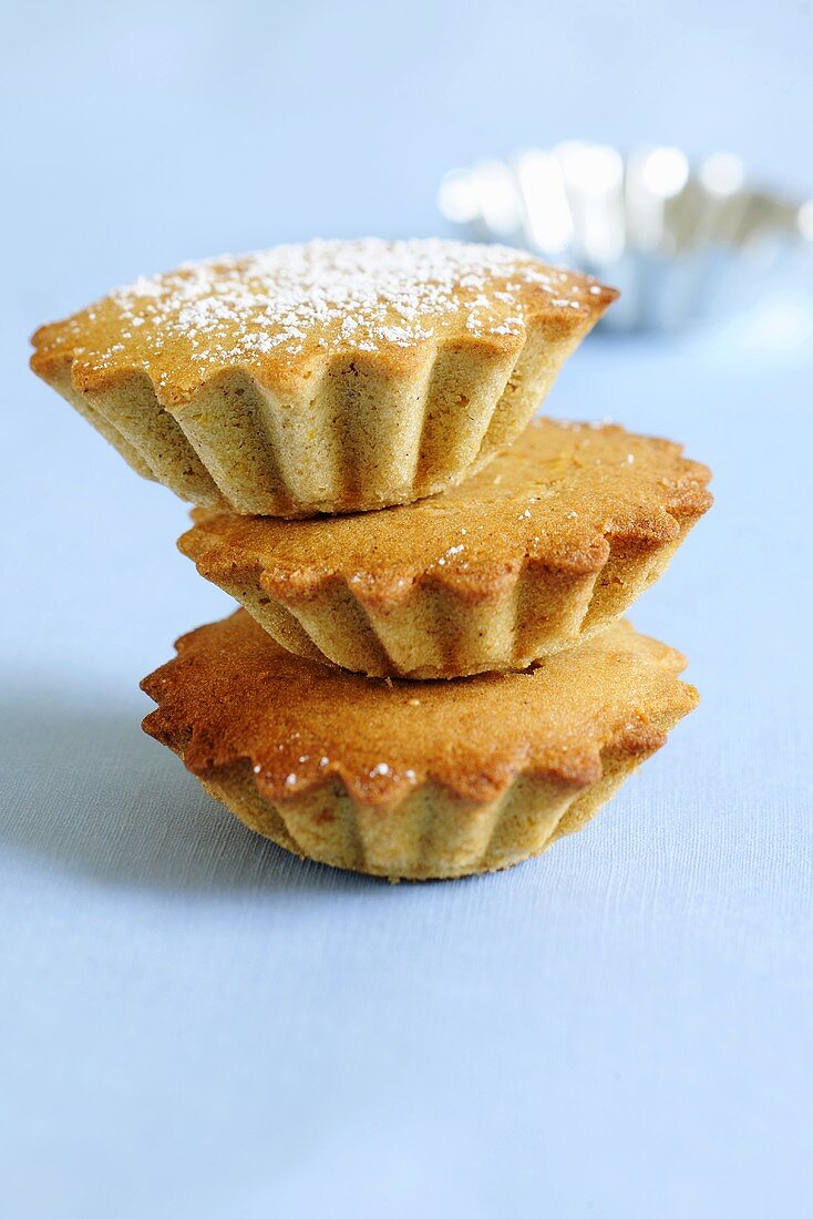 Three mini-muffins, stacked