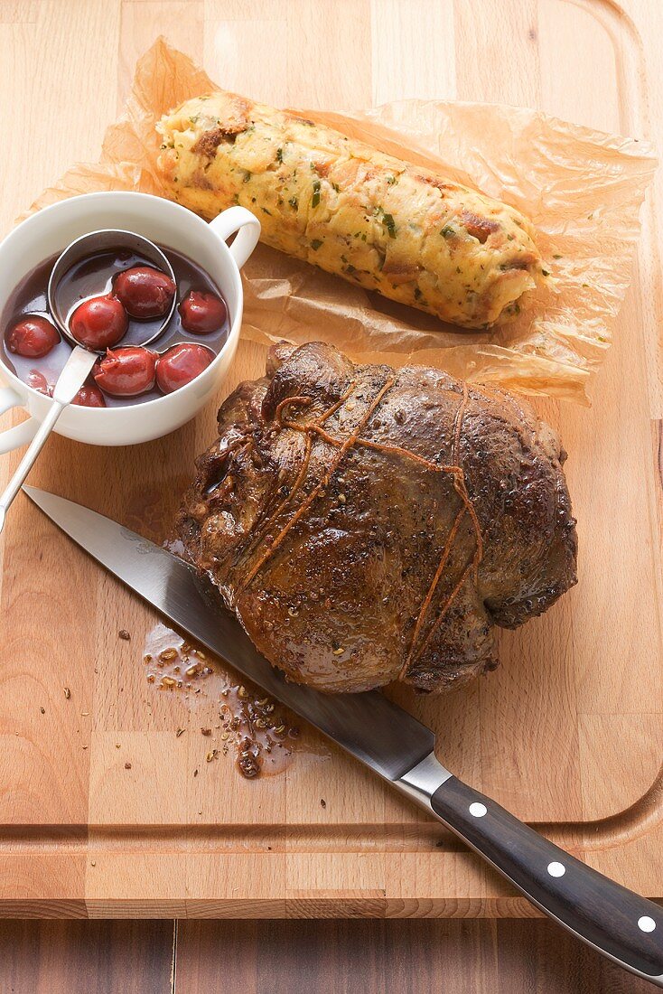 Leg of venison with peppered cherries and napkin dumpling