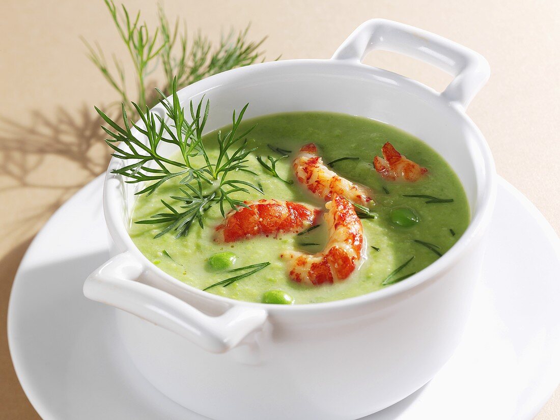 Cream of pea soup with crayfish and dill
