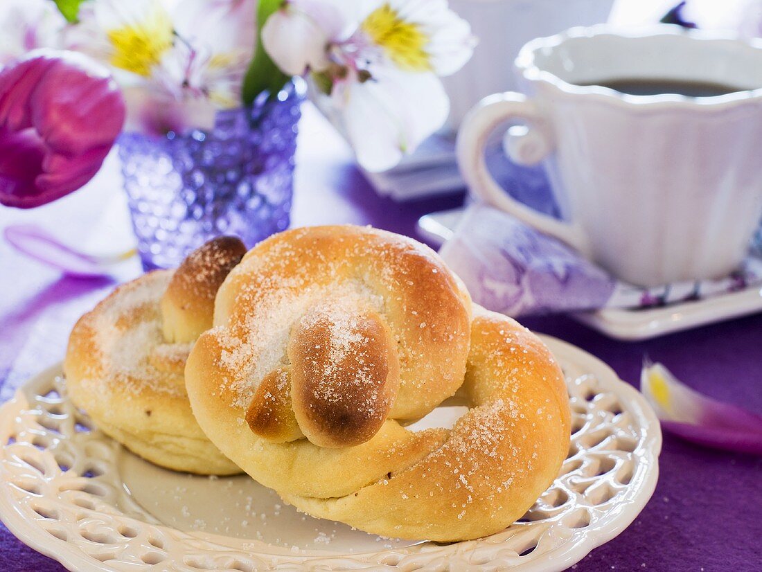 Bread plait sprinkled with sugar