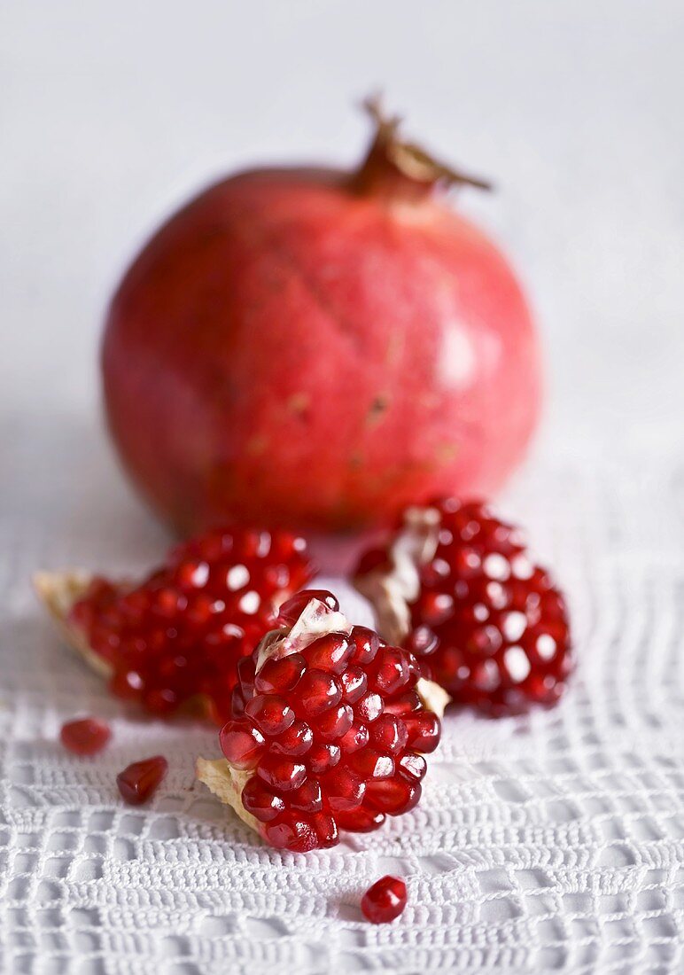 Pomegranate, whole and several pieces