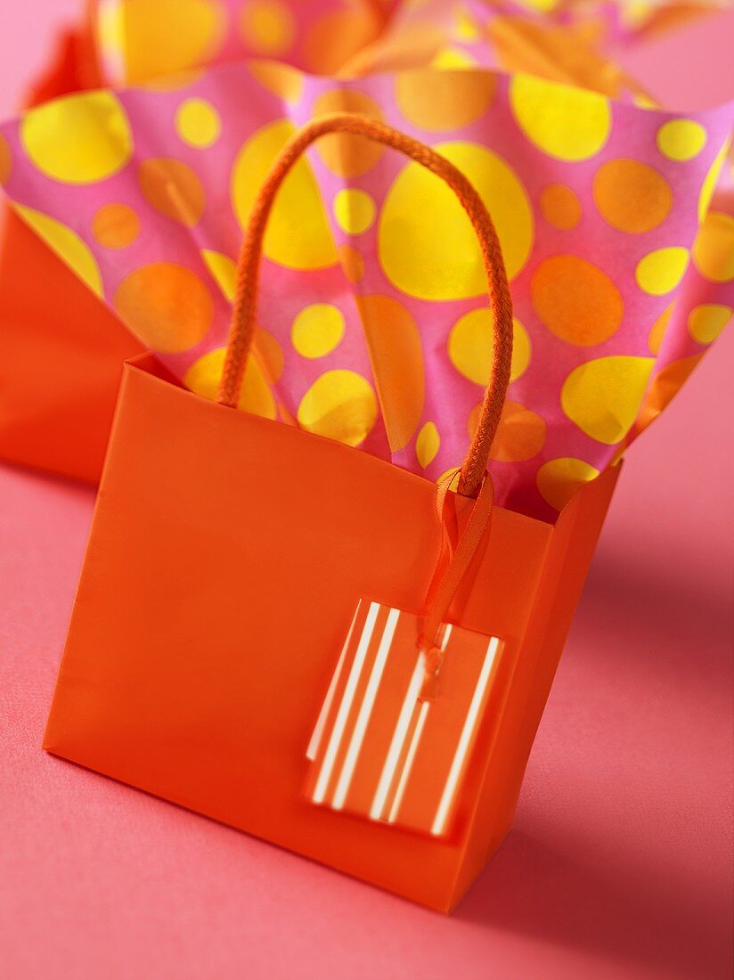 Orange gift bag and wrapping paper