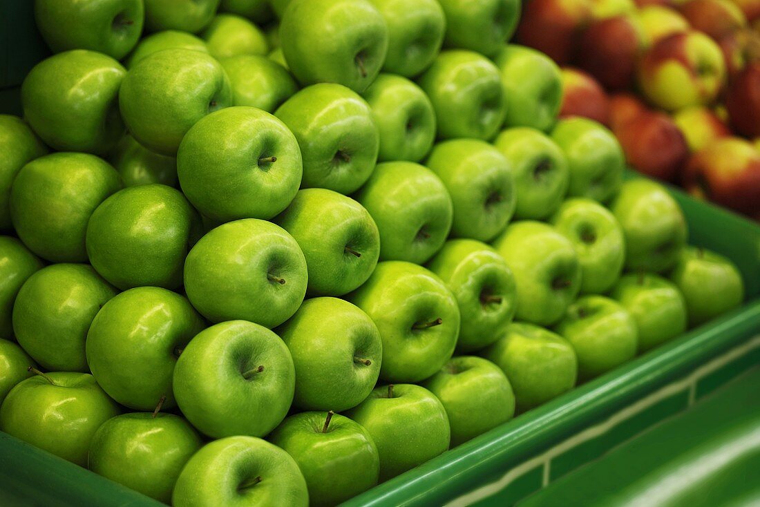 Green apples on a market stall