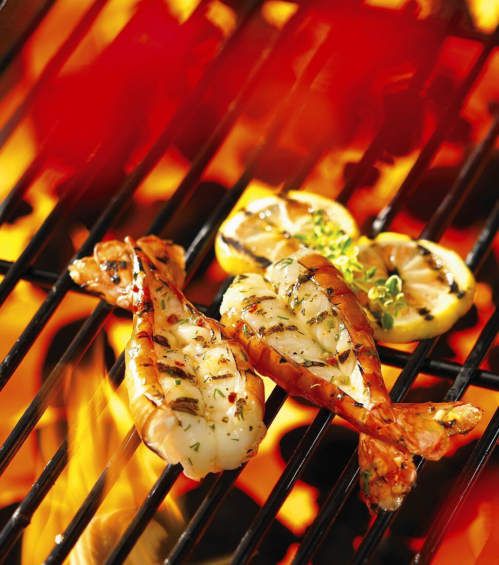 Butterfly prawns on a barbecue