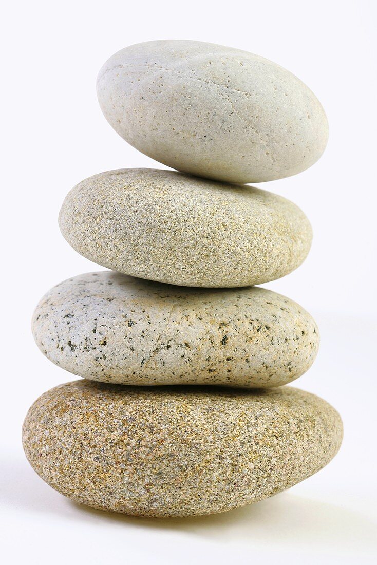 Four pebbles, stacked