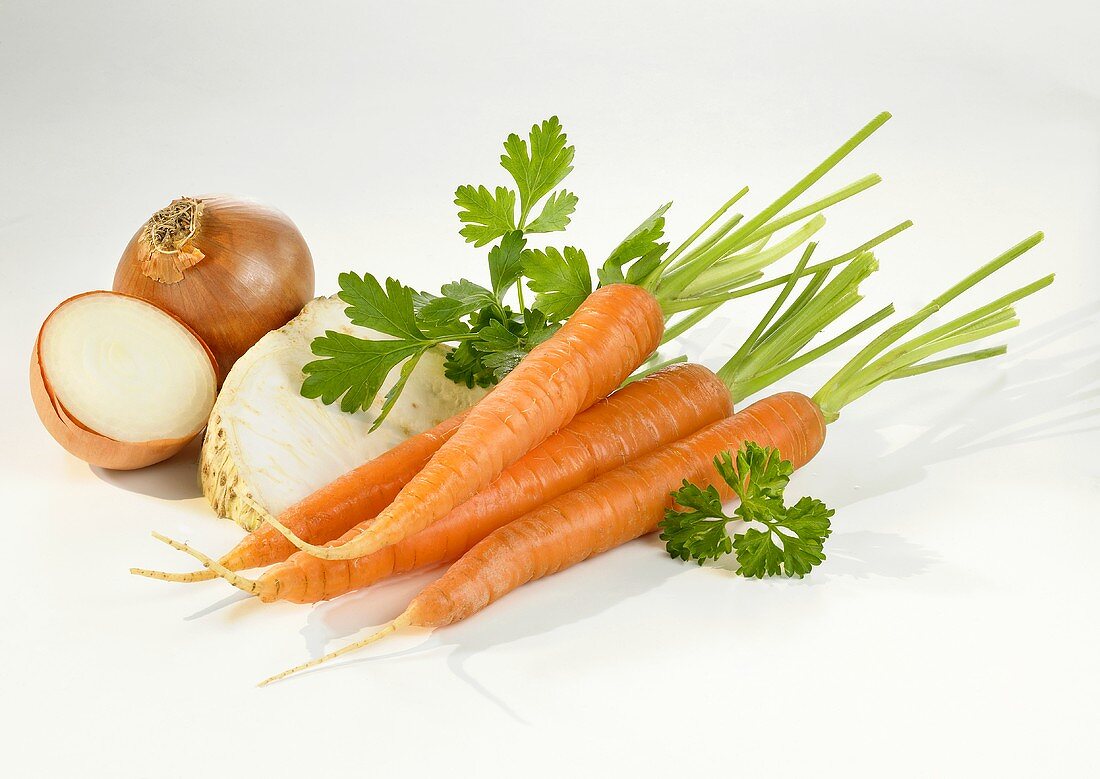 Root vegetables on white background
