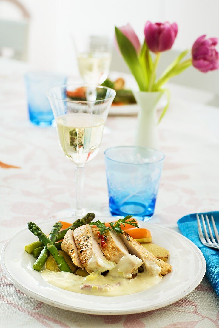 Chicken breast with spring vegetables