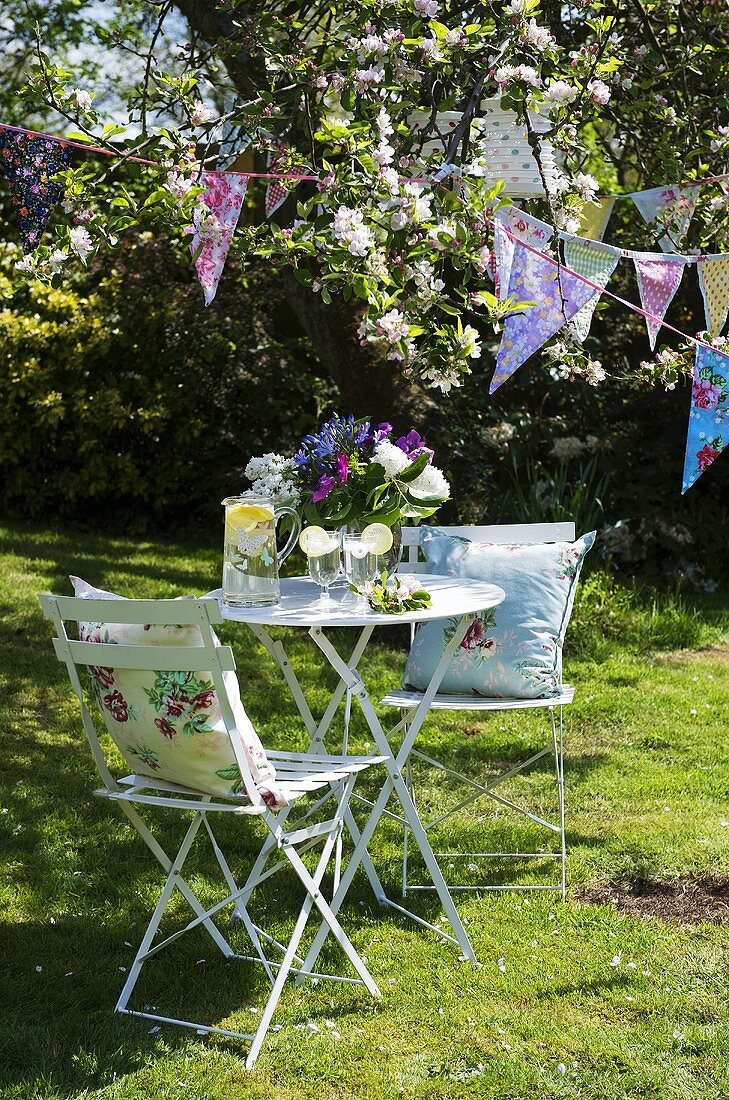 Garden table and chairs with bunting