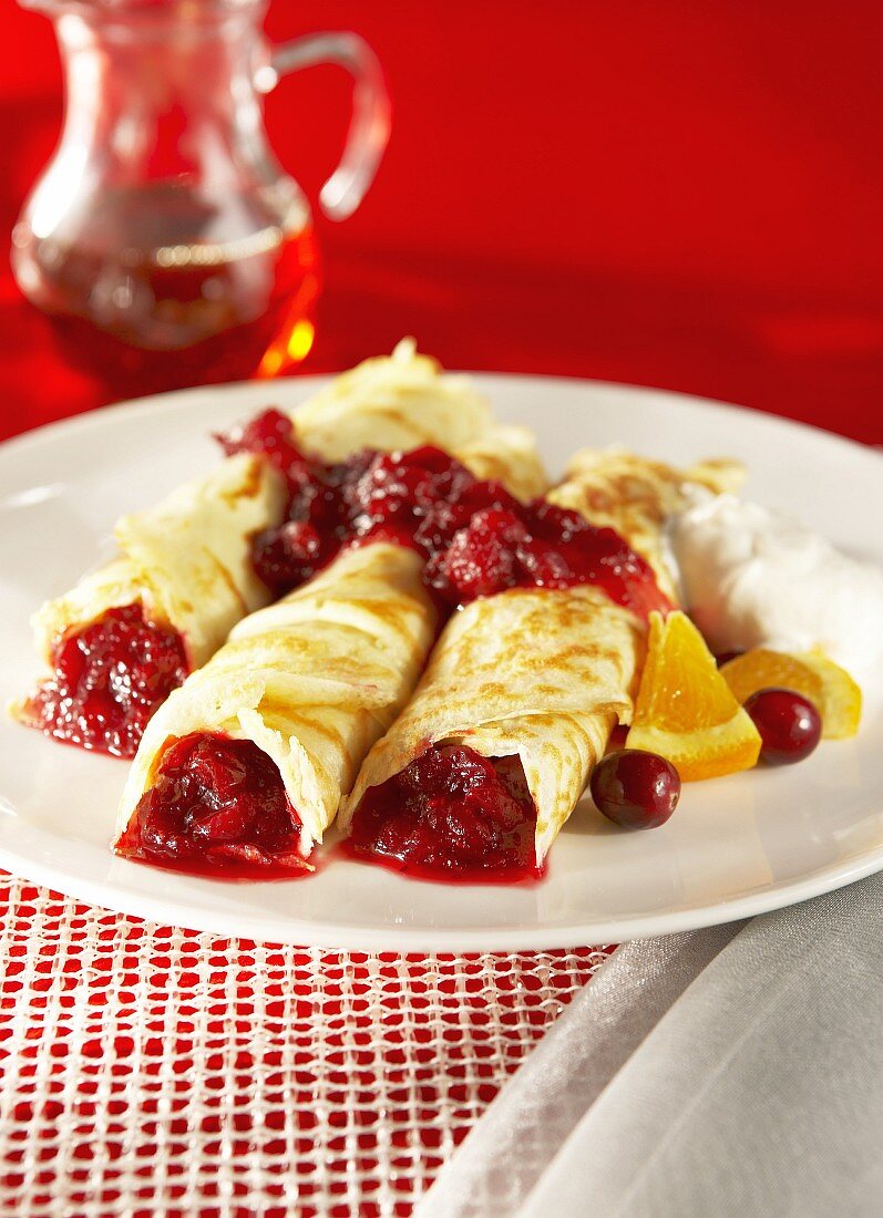 Crêpes with cranberries and cream