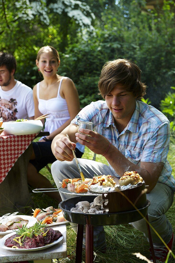 Young people at Italian barbecue