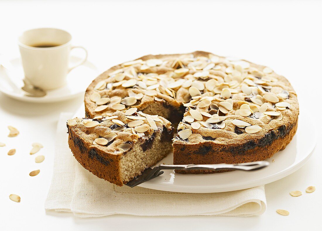 Plum and almond cake with coffee