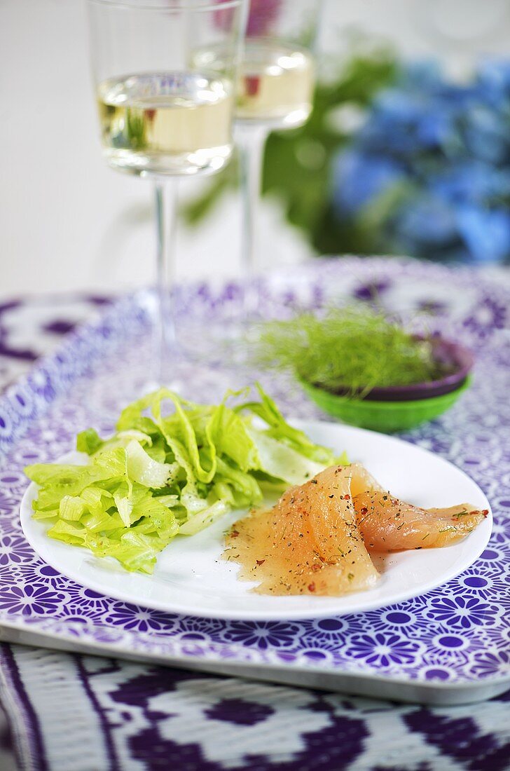 Trout fillet marinated in whisky with green salad