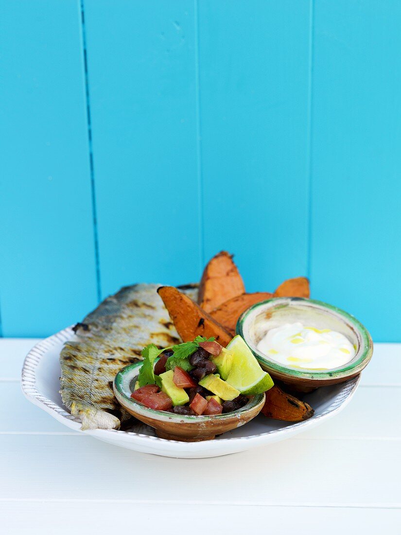 Grilled sea bass with sweet potatoes & tomato & avocado salsa