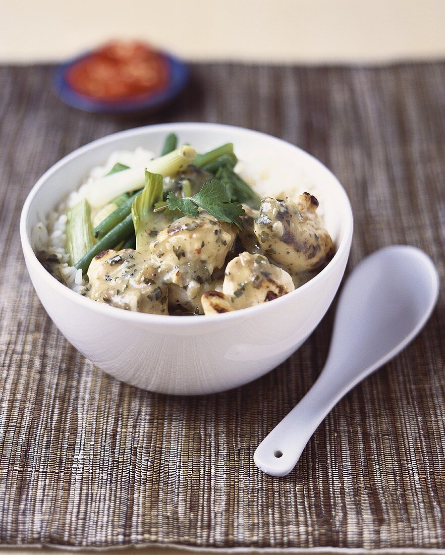 Green chicken curry with spring onions and coriander