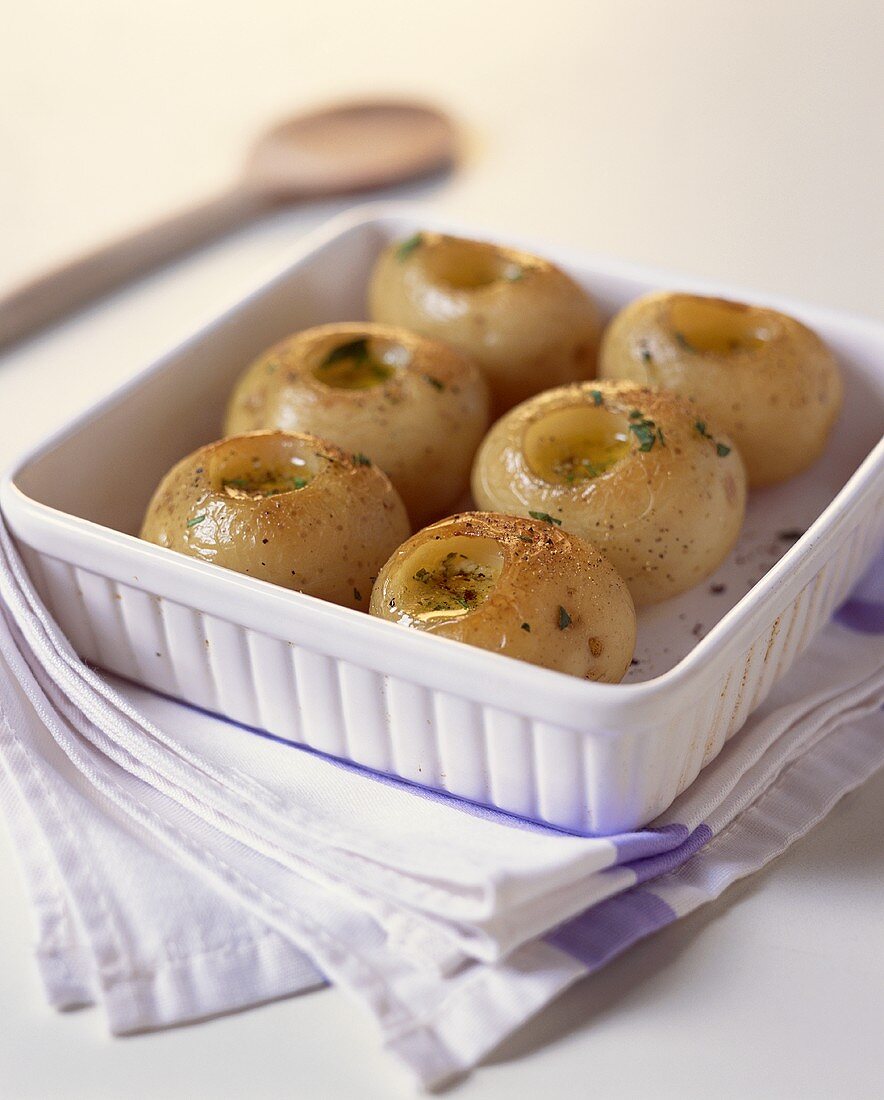 Baked potatoes with parsley butter