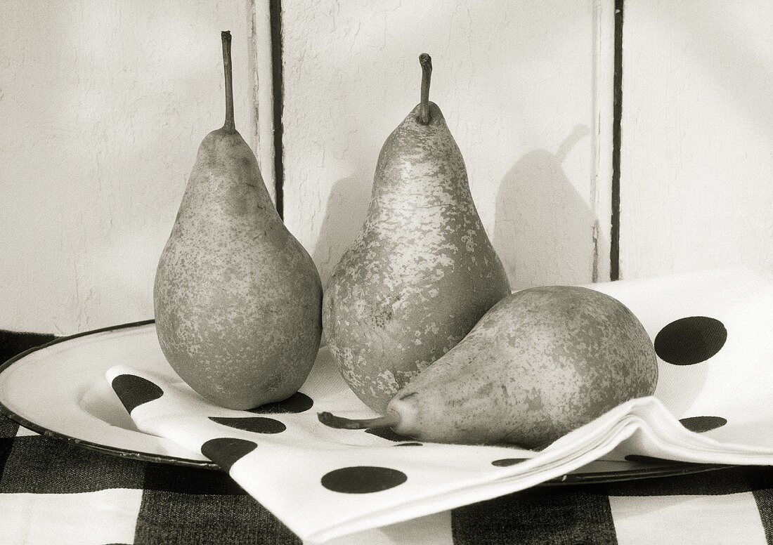 Three pears on a napkin