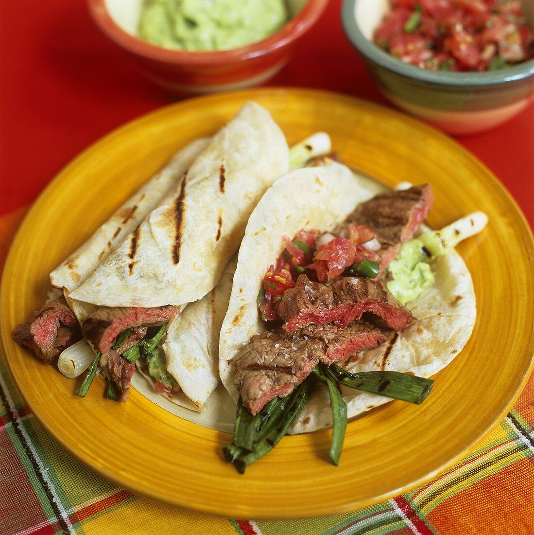 Wheat tortillas with beef and spring onions