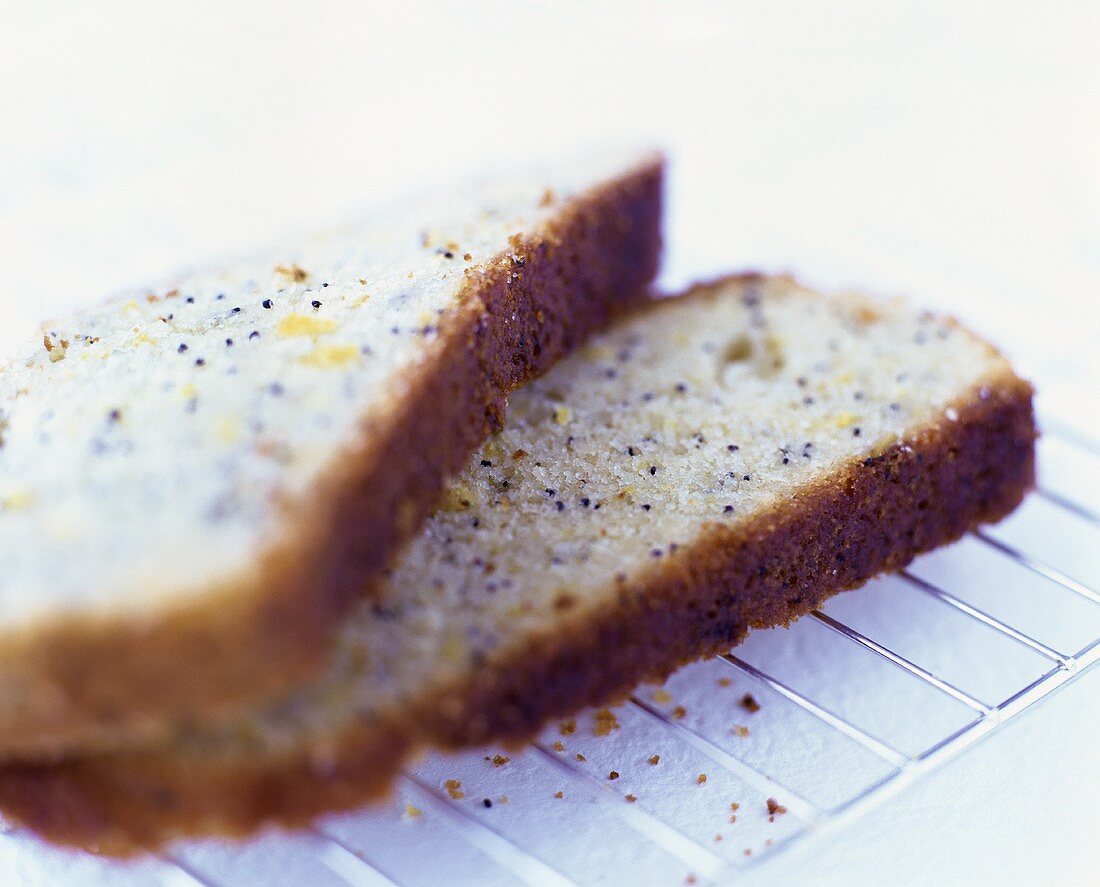 Two slices of lemon and poppy seed cake