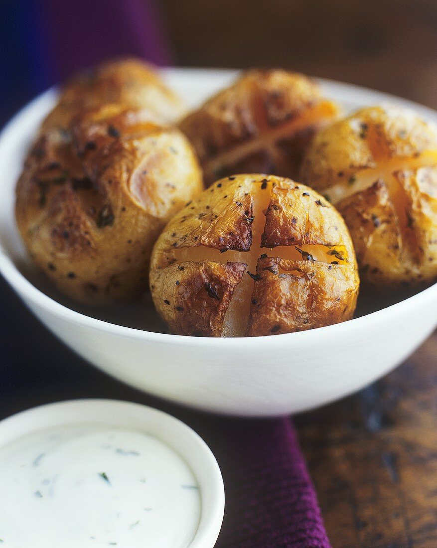 Baked potatoes with sour cream dip