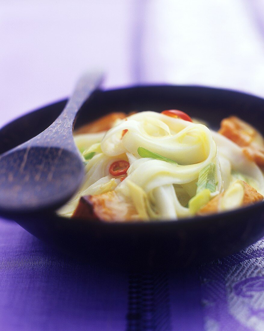 Thai noodles with pumpkin in coconut sauce