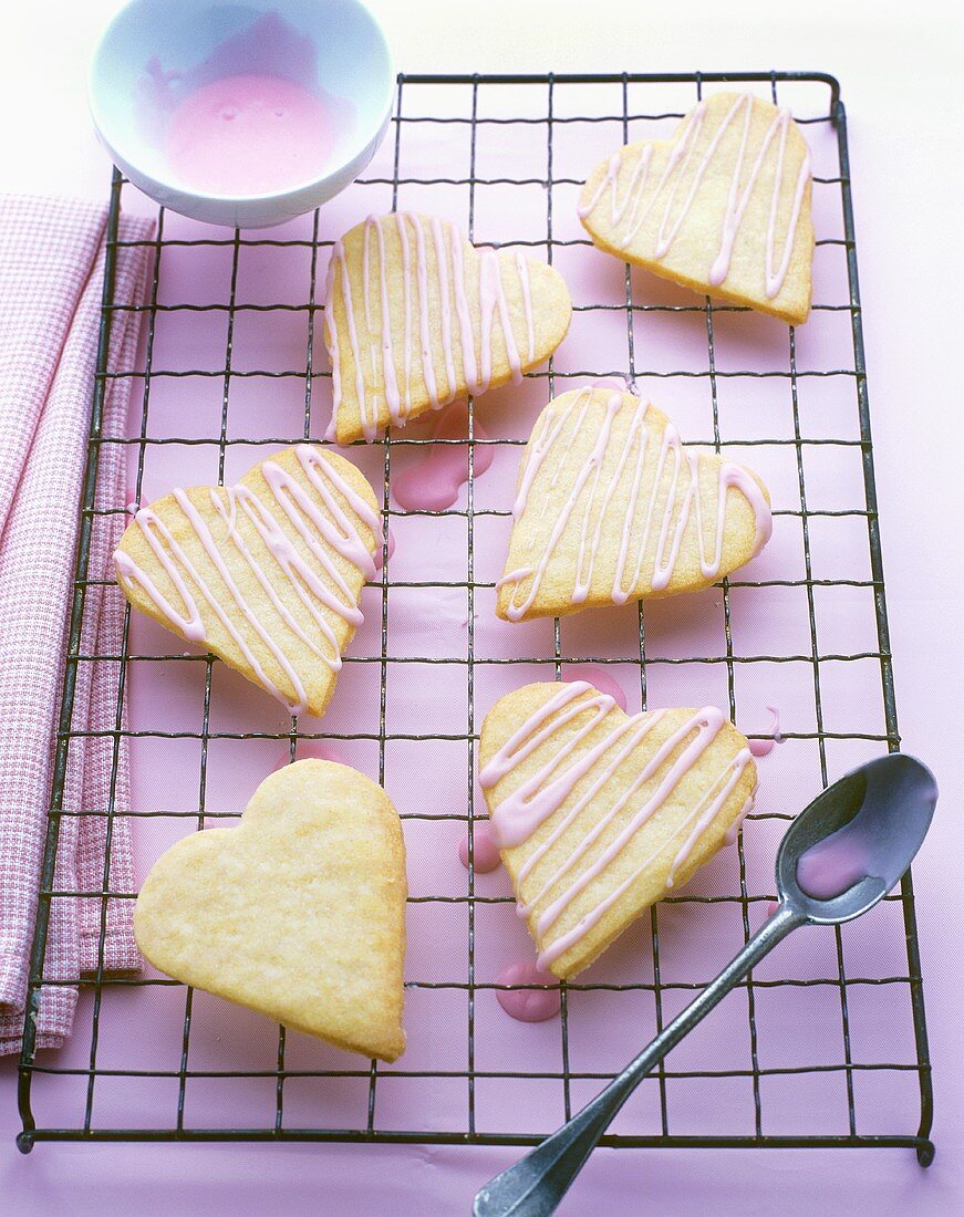 Heart-shaped biscuits with pink icing